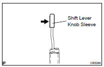 REMOVE SHIFT LEVER KNOB SLEEVE