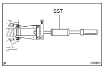 REMOVE TRANSAXLE HOUSING OIL SEAL