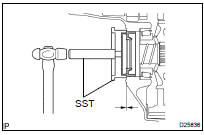 INSTALL DIFFERENTIAL SIDE BEARING RETAINER OIL SEAL