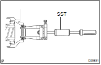 REMOVE TRANSAXLE HOUSING OIL SEAL