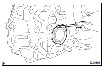  REMOVE TRANSAXLE HOUSING OIL SEAL