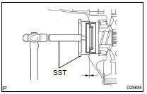 INSTALL DIFFERENTIAL SIDE BEARING RETAINER OIL SEAL