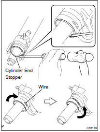 27. REMOVE CYLINDER END STOPPER