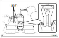 REMOVE POWER STEERING RACK BUSH