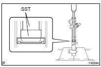 REMOVE POWER STEERING CYLINDER TUBE OIL SEAL