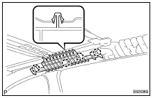 REMOVE REAR SIDE RAIL SPACER RH