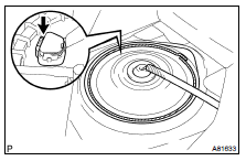 REMOVE REAR FLOOR SERVICE HOLE COVER