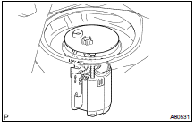 REMOVE FUEL SUCTION TUBE ASSY W/ PUMP & GAGE