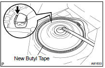 INSTALL REAR FLOOR SERVICE HOLE COVER