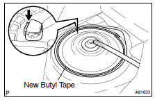 INSTALL REAR FLOOR SERVICE HOLE COVER